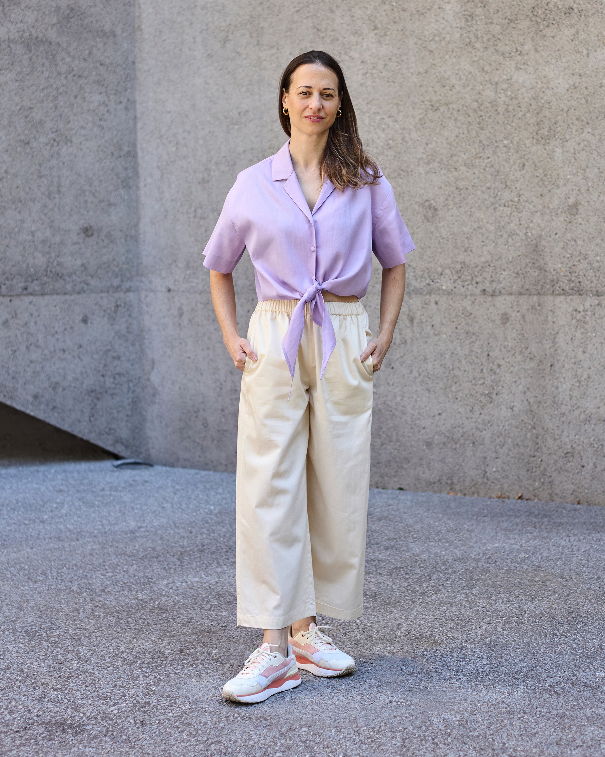 Front view of a petite model wearing the Wide Leg Trouser Ecru.